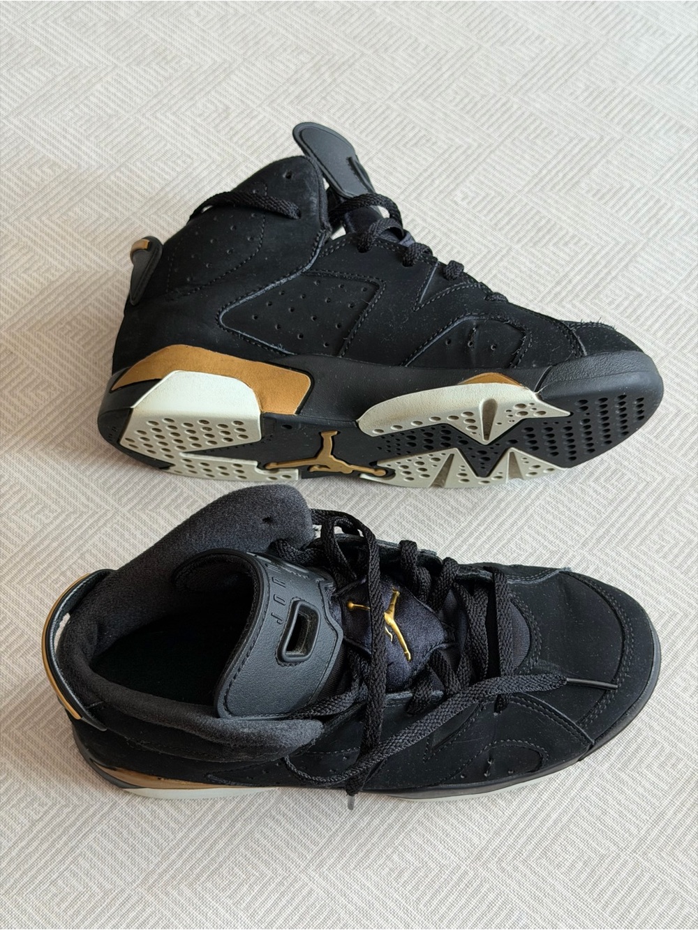 Jordan Black and Gold 6  Retro Sneakers
